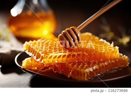 Honey, Close up product of honey and bee Honey, Close up product of honey and bee 116273686