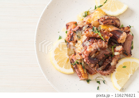 grilled octopus or squid with butter lemon sauce grilled octopus or squid with butter lemon sauce 116276821