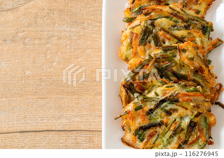 Pajeon or Korean pancake or Korean pizza 116276945