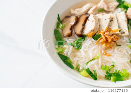 Vietnamese Rice Noodles Soup with Vietnamese Sausage served vegetables and crispy onion 116277136