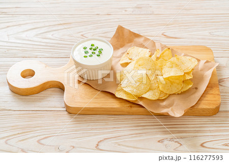 potato chips with sour cream potato chips with sour cream 116277593