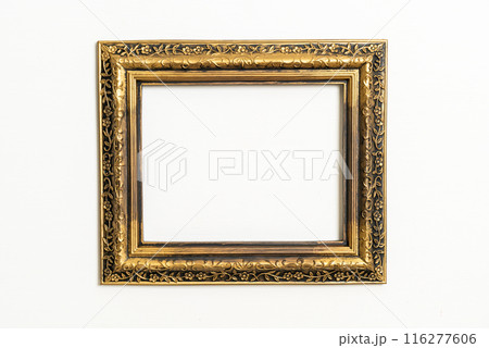 empty picture frame on white wall background empty picture frame on white wall background 116277606