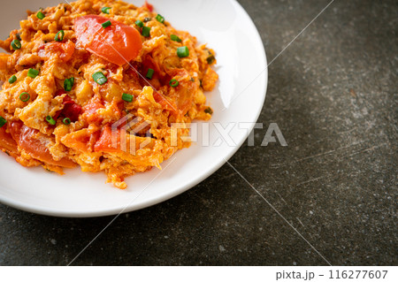 Stir-fried tomatoes with egg or Scrambled eggs with tomatoes 116277607