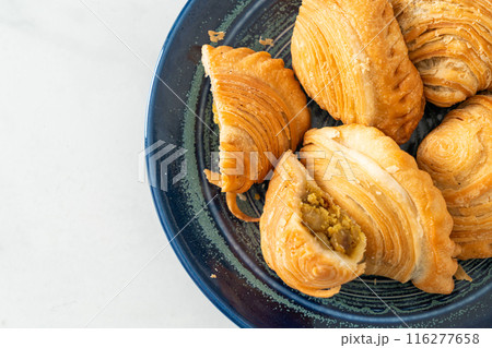 curry puff stuffed chicken on plate 116277658