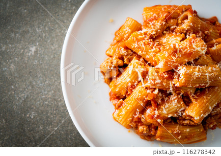 Rigatoni pasta bolognese with cheese 116278342