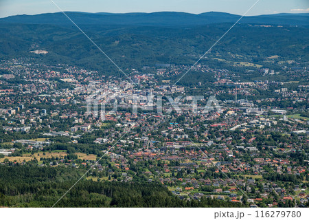 Aerial view of the city of Liberec in Czech republic from the peak of Jested mountain and famous Jested tower Aerial view of the city of Liberec in Czech republic from the peak of Jested mountain and famous Jested tower 116279780