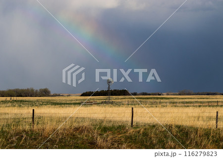 Nature Rainbow over pretty green Nebraska landscape with windmill Nature Rainbow over pretty green Nebraska landscape with windmill 116279823