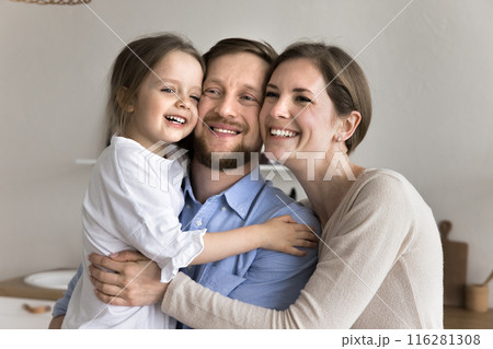 Portrait of happy wellbeing family with preschooler daughter 116281308