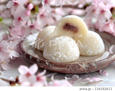 Delightful Mochi Balls Surrounded by Enchanting Cherry Blossoms 116282611
