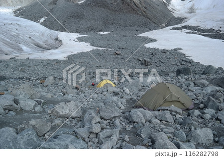 Camping in the Mountains, Snow-Covered Rocks, Glacial View, Serene Wilderness Experience Camping in the Mountains, Snow-Covered Rocks, Glacial View, Serene Wilderness Experience 116282798