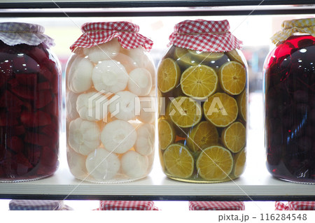 Canned fruits and vegetables in glass jars 116284548