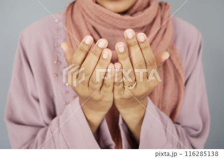 Close up of muslim women hand praying at ramadan  116285138