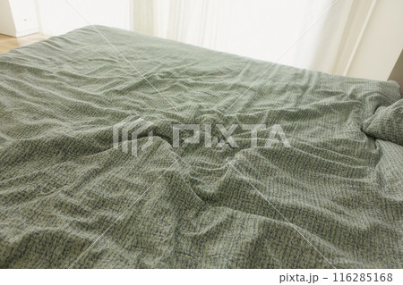 messy bed in early morning , messy bed after waking up messy bed in early morning , messy bed after waking up 116285168
