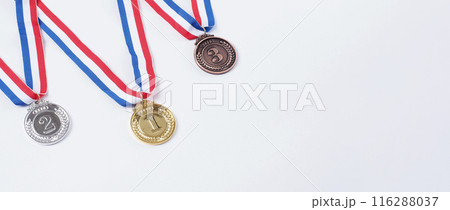 Gold silver and bronze demonstration trophy medals with ribbon for school university or national or olympic sport even organization competition. Isolated on white background. Award and victory concept Gold silver and bronze demonstration trophy medals with ribbon for school university or national or olympic sport even organization competition. Isolated on white background. Award and victory concept 116288037