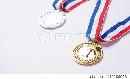 Gold silver and bronze demonstration trophy medals with ribbon for school university or national or olympic sport even organization competition. Isolated on white background. Award and victory concept 116288038