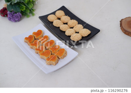 Kue Lebaran is an Assorted Indonesian specialty cookies for Eid al-Fitr or Eid Mubarak. such as Nastar, snow white, kaastengels and thumbprint cookies. 116290276