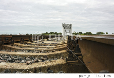 Railway track of single-track railway and railway bridge. Rails and railway sleepers and railway bridge Railway track of single-track railway and railway bridge. Rails and railway sleepers and railway bridge 116291060