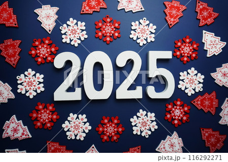 Happy New Year 2025 alphabet letter with Christmas decoration on blue background Happy New Year 2025 alphabet letter with Christmas decoration on blue background 116292271