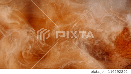 Steam cloud. Magic spell. Spiritual aura. Floating ink vapor mix. Orange glitter haze over glitter shiny dark background hypnotic mystical wave texture art. Steam cloud. Magic spell. Spiritual aura. Floating ink vapor mix. Orange glitter haze over glitter shiny dark background hypnotic mystical wave texture art. 116292292