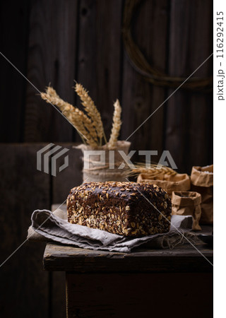 Loaf wholegrain bread with seeds 116292415