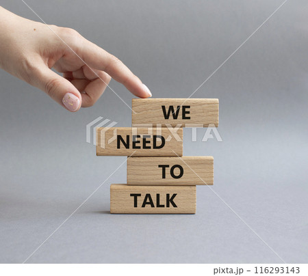 We need to talk symbol. Concept words We need to talk on wooden blocks. Beautiful grey background. Businessman hand. Business and We need to talk concept. Copy space. We need to talk symbol. Concept words We need to talk on wooden blocks. Beautiful grey background. Businessman hand. Business and We need to talk concept. Copy space. 116293143