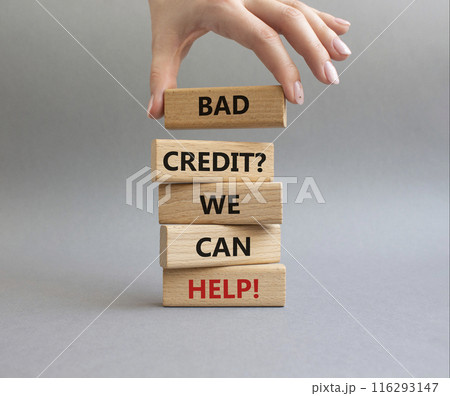 Bad credit We can Help symbol. Wooden blocks with words Bad credit We can Help. Beautiful grey background. Businessman hand. Business and Bad credit We can Help concept. Copy space. 116293147