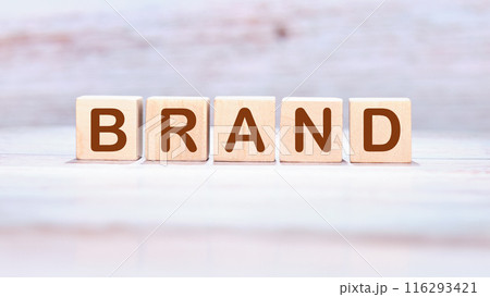 Customer retention concept. BRAND assembled from wooden cubes Customer retention concept. BRAND assembled from wooden cubes 116293421