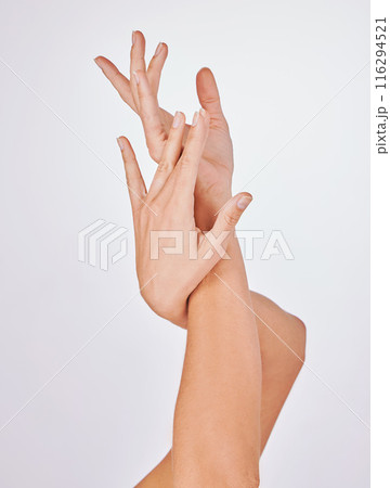Woman, hands and manicure or nails in studio, skincare and twist for cosmetics on white background. Female person, pamper and grooming treatment or health, beauty polish and dermatology wellness 116294521