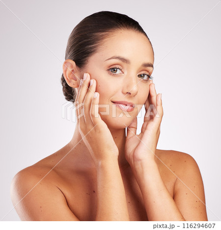 Woman, smile and beauty with skincare in studio for facial wellness, healthy skin and portrait with treatment. Model, person and face with pride for dermatology, glow or cosmetics on white background 116294607