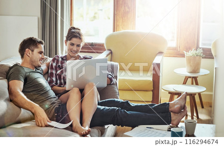 Couple, laptop and typing in living room, paperwork and document of loan, marriage and home on weekend morning. House, man and woman on sofa, bills and together in lounge, couch and happiness Couple, laptop and typing in living room, paperwork and document of loan, marriage and home on weekend morning. House, man and woman on sofa, bills and together in lounge, couch and happiness 116294674