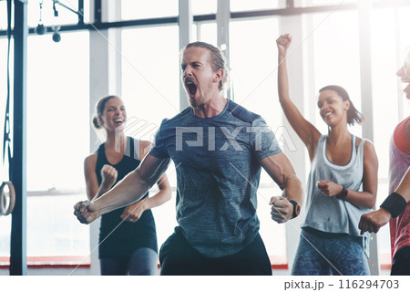 Fitness, man and scream to celebrate success in exercise class, workout and training goals. Sports, people and happiness for power challenge, winner or performance achievement at health club or gym 116294703