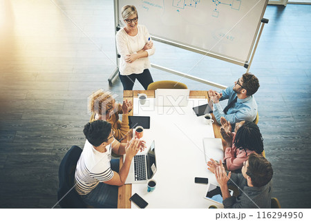 Business people, presentation and coaching with applause in meeting for thank you, congratulations or well done above at office. Top view, group or employees clapping hands in celebration or teamwork 116294950