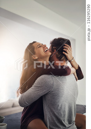 Couple, hug and laughing in kitchen counter with love, bonding and smile together at home. Embrace, romance and happy people with marriage with care, trust and commitment in house with fun and joke Couple, hug and laughing in kitchen counter with love, bonding and smile together at home. Embrace, romance and happy people with marriage with care, trust and commitment in house with fun and joke 116295290