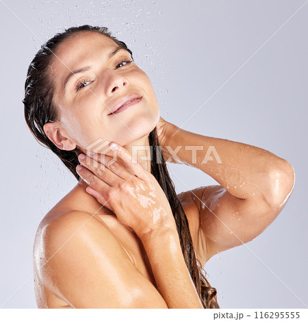 Shower, hair care and woman in studio with portrait for shampoo, water drops or hygiene on white background. Clean, body and female model washing for natural treatment, wellness or morning routine Shower, hair care and woman in studio with portrait for shampoo, water drops or hygiene on white background. Clean, body and female model washing for natural treatment, wellness or morning routine 116295555
