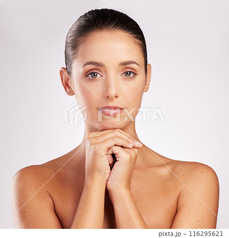 Portrait, hands and woman in studio with skincare for natural treatment, cosmetics or dermatology on white background. Spa, body and female model with shine for beauty, aesthetic or wellness results Portrait, hands and woman in studio with skincare for natural treatment, cosmetics or dermatology on white background. Spa, body and female model with shine for beauty, aesthetic or wellness results 116295621