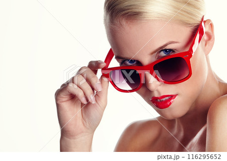 Portrait, woman and sunglasses for makeup in studio with .red lipstick, pride and mockup space. Confidence, model girl and eyes for cosmetics, fashion and aesthetics or retro by white background 116295652