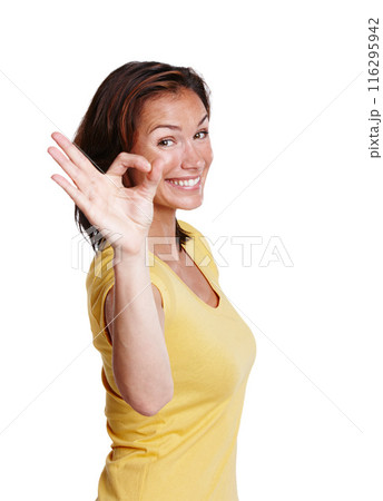 Ok, hand and portrait of woman for achievement or success in studio with smile and pride. Review or vote, female person and yes emoji for good news and agreement by white background for like gesture 116295942