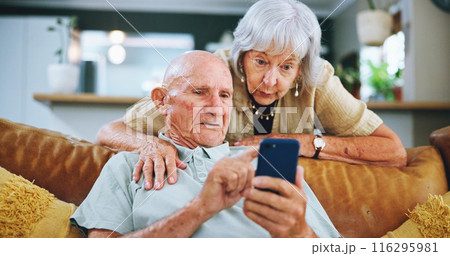 Senior couple, phone and search on couch for hug, choice and help with video, download and confused in home. Elderly woman, man and smartphone on sofa in lounge with thinking for post on social media 116295981