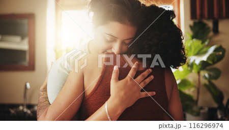 Lgbtq, couple and hug with love in home for romantic relationship, connection and affection with happiness. Woman, bonding and commitment in house for queer partnership, pride and embrace with care Lgbtq, couple and hug with love in home for romantic relationship, connection and affection with happiness. Woman, bonding and commitment in house for queer partnership, pride and embrace with care 116296974