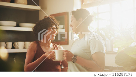 Women, couple and lesbian in kitchen with coffee on morning for breakfast, relax and enjoy. Support, care and happy or conversation with cup of tea to chill, fun and bonding in home on caffeine drink 116297175