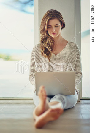 Relax, laptop and woman on floor in home for streaming subscription, watching movies and internet. Lens flare, apartment and person on computer for website, networking and research in living room 116297862