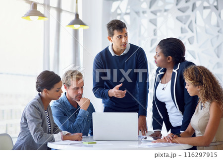 Business people, laptop and cooperation with conversation, brainstorming and professional in modern office. Staff, employees and coworkers with ideas, collaboration and teamwork with planning or pc 116297915