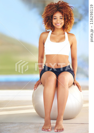 Woman, happy and portrait in home with medicine ball for exercise, workout and satisfied with progress. Female person, house and smile or confident with fitness for health, wellbeing and wellness Woman, happy and portrait in home with medicine ball for exercise, workout and satisfied with progress. Female person, house and smile or confident with fitness for health, wellbeing and wellness 116298119