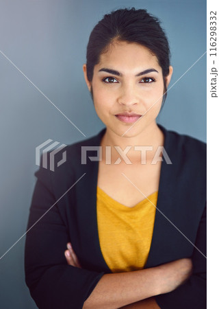 Business woman, portrait and crossed arms in studio on gray background for career, job and work. Employee, serious and confident accountant for pride, professional and corporate agenda with goals 116298332