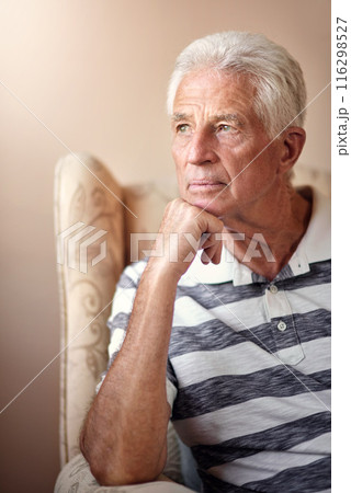 Senior man, relax and thinking on chair in home for retirement, memory and nostalgia. Male person, thoughtful and calm in seat for remembering history, past experiences and contemplating pension 116298527