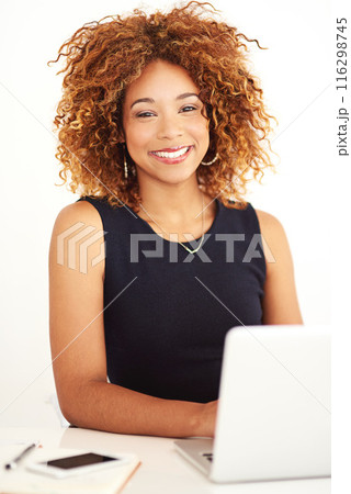 Business, portrait and woman with smile, laptop and confidence for online project, research or email in studio. Tech, pride and happy consultant at desk with computer, agenda and white background Business, portrait and woman with smile, laptop and confidence for online project, research or email in studio. Tech, pride and happy consultant at desk with computer, agenda and white background 116298745