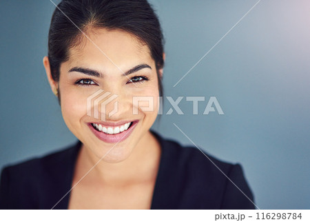 Studio, business and face of woman, confident and professional with pride, USA and lawyer. Blue background, student and smile of person, internship and career in law firm for financial advisor 116298784