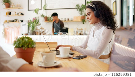 Laptop, cafe and woman with remote work, video call and headphones for social media webinar. Typing, music and website update of a web designer working at a restaurant and coffee shop with drink 116299381