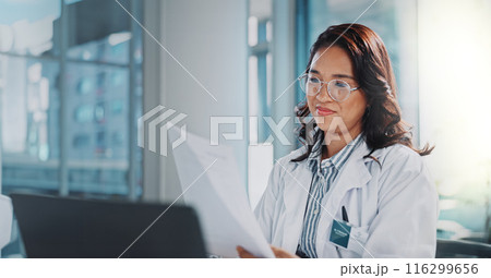 Woman, doctor and smile with paperwork or laptop for research or study results and feedback. healthcare, medical and happy or satisfied with document for medicine or patient information in office 116299656