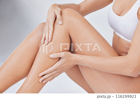 Woman, underwear and legs smooth for epilation, skincare and cosmetics in white studio background. Female person, wax or clean shave touching for health, wellness and hygiene or hair removal Woman, underwear and legs smooth for epilation, skincare and cosmetics in white studio background. Female person, wax or clean shave touching for health, wellness and hygiene or hair removal 116299921
